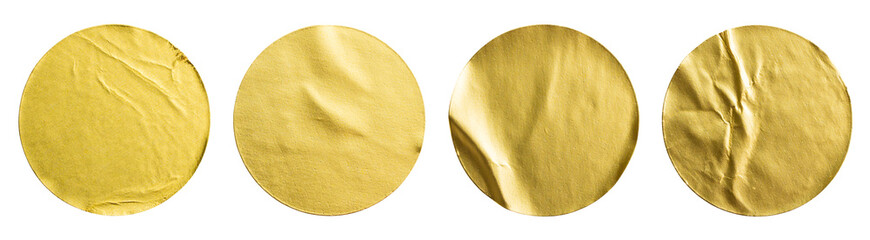 Blank golden round adhesive paper metallic sticker label set isolated on white background
