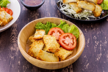 Fish Finger on wooden background