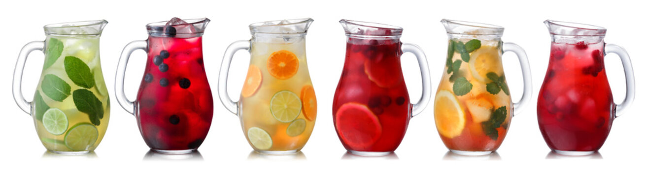 Iced drinks in pitchers isolated