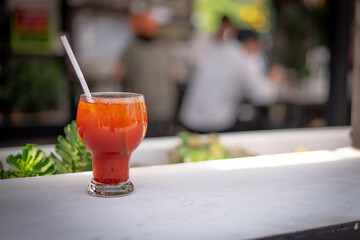 ice lemon tea in a glass on the white table.