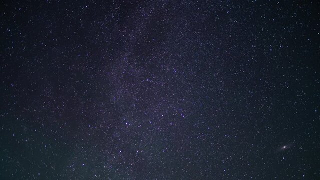 Airglow Andromeda and Milky Way Galaxy Above Trona Pinnacles 50mm North Sky Purple Death Valley Region California USA Time Lapse