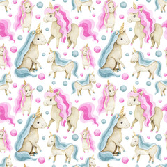 Watercolor seamless pattern with pink and blue unicorns, bubbles. Festive repeatable background for holiday designs