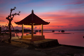 sunset over pagoda on Bali