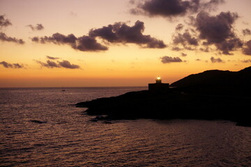 Magico amanecer en el faro Punta Arenella. Llançà. Costa Brava. Cataluña