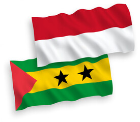 National vector fabric wave flags of Indonesia and Saint Thomas and Prince isolated on white background. 1 to 2 proportion.