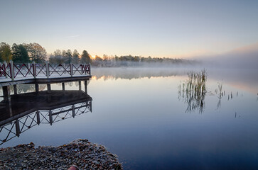 Foggy lake landscape in October