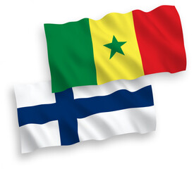 National vector fabric wave flags of Finland and Republic of Senegal isolated on white background. 1 to 2 proportion.