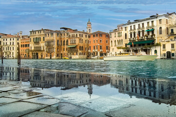 This is Aqua Alta on the embankment of the Grand Canal, high water, flooding in Venice, Italy.