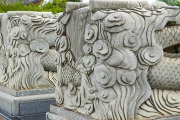 Intricately carved stone lion close-up