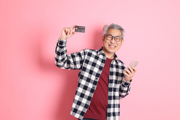 Naklejka premium Asian Man on Pink
