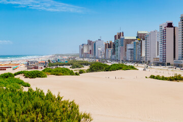 Fototapeta na wymiar Necochea city, Buenos Aires, Argentina. view of the dunes and Los patos beach. The city at background.