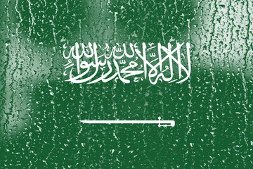 3D Flag of Saudi Arabia on a glass with water drop background.