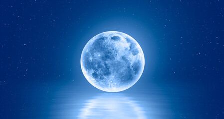 Abstract blue background with full  moon over the sea,  lot of stars in the background at night ...