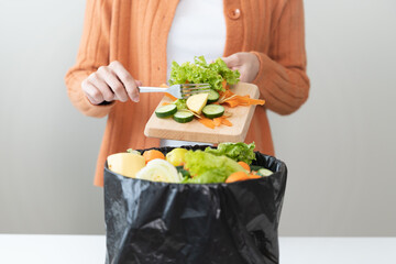 people put bio trash from food waste in domestic homes to compost bins to make fertilizer to reduce global environmental pollution.