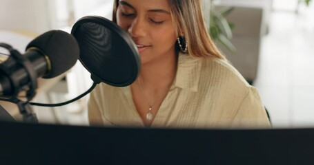 Singer, music and creative woman recording or live streaming in professional musician studio. Young female artist, working to create song or produce audio podcast on microphone at production company