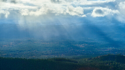 Fototapeta na wymiar Autumn mountain panorama with cloudy sky at sunset in Oregon.