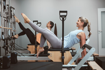 Young women exercising in a gym.