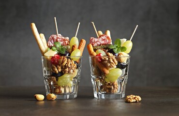 Appetizer Charcuterie Cups. Jarcuterie trend. Individual Appetizers for Social Distancing. Selective focus