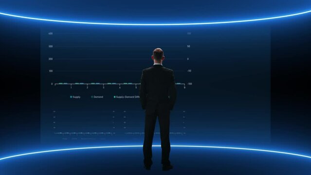 Businessman is standing in front of digital screen with diagrams and business charts on it. Technology, investment, money and teamwork concept.