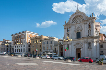 The beautiful Piazza Duomo in L'Aquila with historic buildings and churches