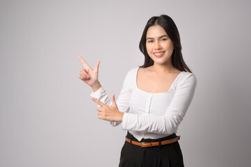 Portrait of young beautiful woman smiling over white background studio