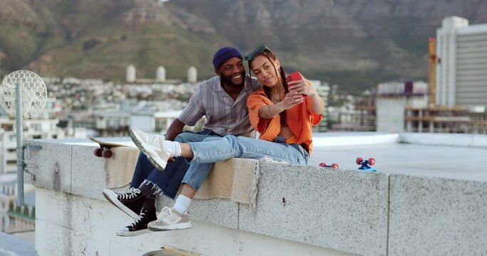 Selfie, city and interracial couple with smile on a wall during holiday in Morocco for adventure. Happy, young and black man and woman with photo on mobile during travel, vacation and summer together