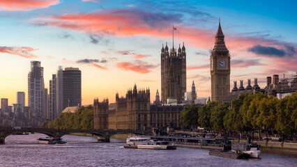Fototapeta na wymiar Historic Landmark, Big Ben, at Palace of Westminster. Cloudy Sunset Sky Art Render. London, United Kingdom. Travel Destination