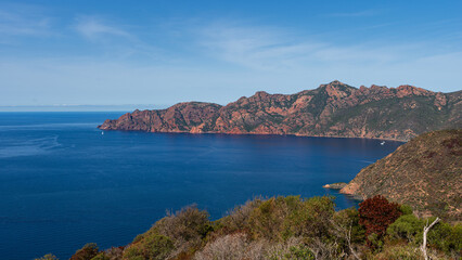 View from famous D81 coastal road with view of Gulf de Girolata from Bocca di Palmarella, Corsica, France, Europe