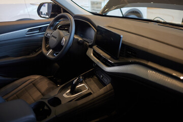 Fototapeta na wymiar Modern suv car interior with leather panel, multimedia and dashboard.