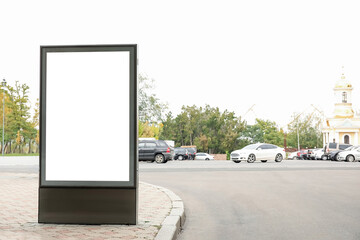 Modern blank advertising billboard on city street