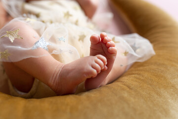 the legs of the newborn baby. the legs of the newborn flaky skin. peel off the skin. peeling skin newborn. newborn child. feet