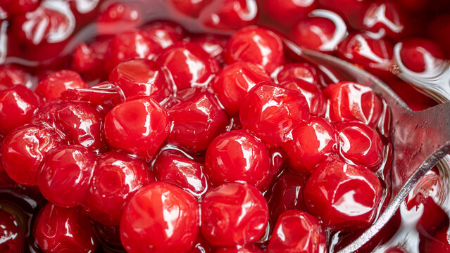 Highly detailed, and bright red close up of lingonberry jam. The berries are grown in the wild and usually harvested late summer, early autumn. 