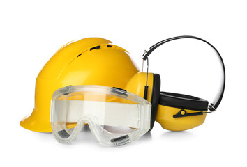 Hearing protectors with hardhat and safety goggles on white background