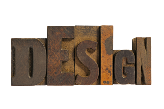 Isolated word design spelled out in vintage antique wood letterpress type blocks