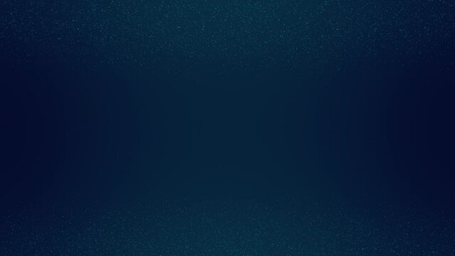 Cyan tiny dots glitter on dark blue gradient background that spin on the top and bottom of the frame. Abstract backdrop party or Christmas holidays and New Year concept with copy space