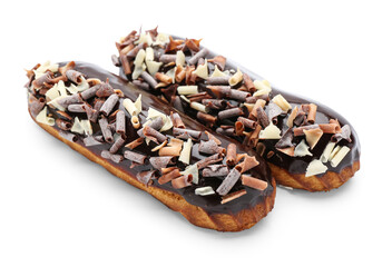 Sweet chocolate eclairs on white background