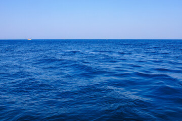 Fototapeta premium View of the open sea from the yacht. Background with selective focus