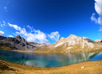 Lago di Rims mountain lake located in Swiss Alps in Val Müstair, Switzerland