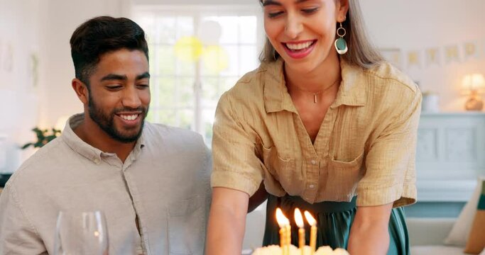 Birthday, cake and couple kiss with celebration, surprise and gift from wife to her husband with love in home. Man and woman celebrating, party and happy together with a present, snack or dessert