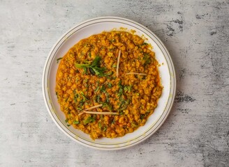 daal chana ghotala served in a plate isolated on background top view of indian and pakistani desi...