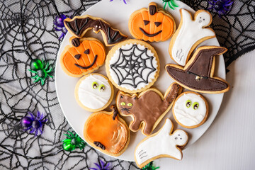 halloween dessert sweet baked trick or treat cookies, cake, bisquits shaped pumpkin, ghost, with,  - 541066893