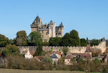 Chateau de Montfort, a private residence in Dordogne France, clear blue sky