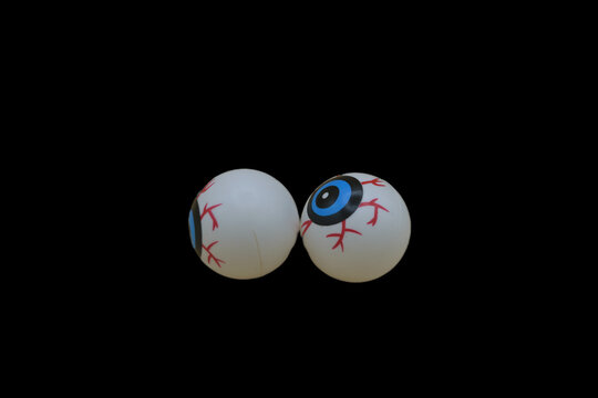Two Spooky Eyeballs Black Background