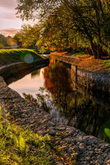 Naklejka premium Morning in Bruges. Old houses on the banks of the canal 