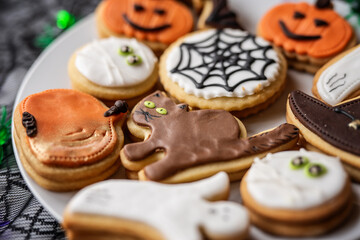 halloween dessert sweet baked trick or treat cookies, cake, bisquits shaped pumpkin, ghost, with,  - 541070068