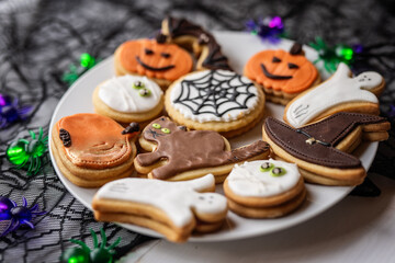 halloween dessert sweet baked trick or treat cookies, cake, bisquits shaped pumpkin, ghost, with,  - 541070283