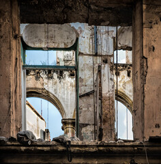 Obscure window in dilapidated building in Havana, Cuba