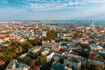Obraz premium Old city center view in Krakow. Central market square in Wroclaw Poland with old colourful houses. Krakow Market Square from above, aerial view of old city center view in Krakow. Medieval city center.