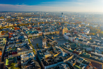 Obraz premium Old city center view in Krakow. Central market square in Wroclaw Poland with old colourful houses. Krakow Market Square from above, aerial view of old city center view in Krakow. Medieval city center.