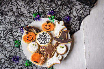 halloween dessert sweet baked trick or treat cookies, cake, bisquits shaped pumpkin, ghost, with,  - 541071490